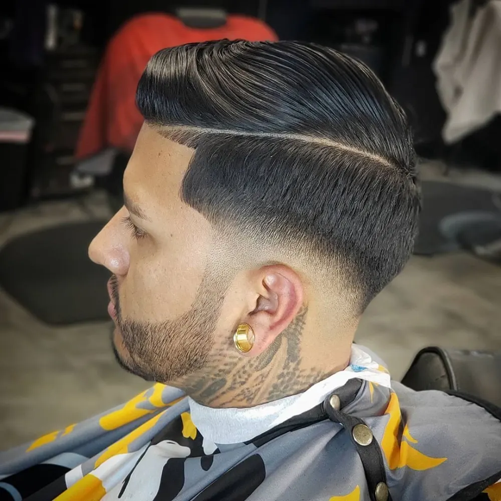 Corte con degradado realizado en el curso de barbería